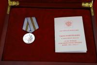 Путін нагородив Кім Чен Ина медаллю (фото)