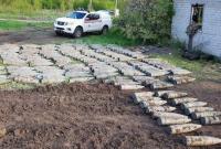 На Луганщине СБУ обнаружила схрон с почти 300 артиллерийскими снарядами (фото)