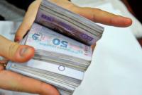Украинцам разрешат снимать наличные с карт на кассах супермаркетов
