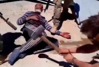 "Позвонки ломай!" СМИ показали зверства ЧВК "Вагнер" в Сирии (фото)