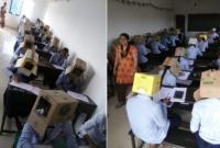 В Индии студентов заставили сдавать экзамен с коробками на голове (фото)